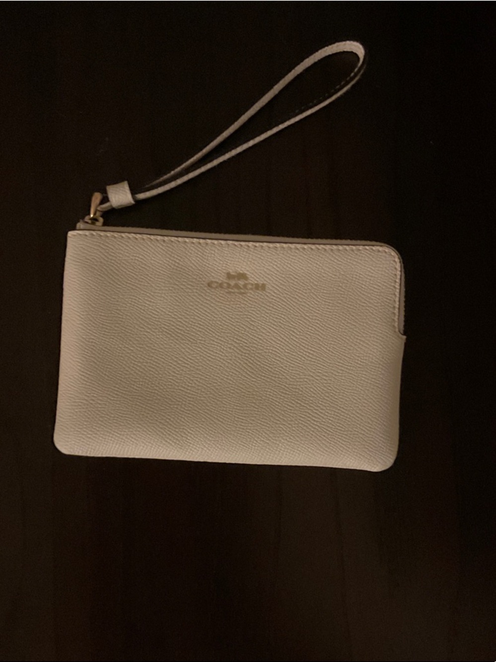 Coach Ivory Pebbled Leather Wristlet with Gold Logo